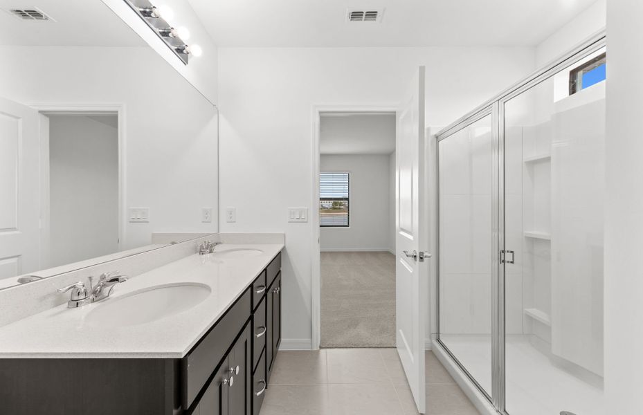 Furnished interior view inside a new home in Whispering Lakes, Lehigh Acres (Image 13).