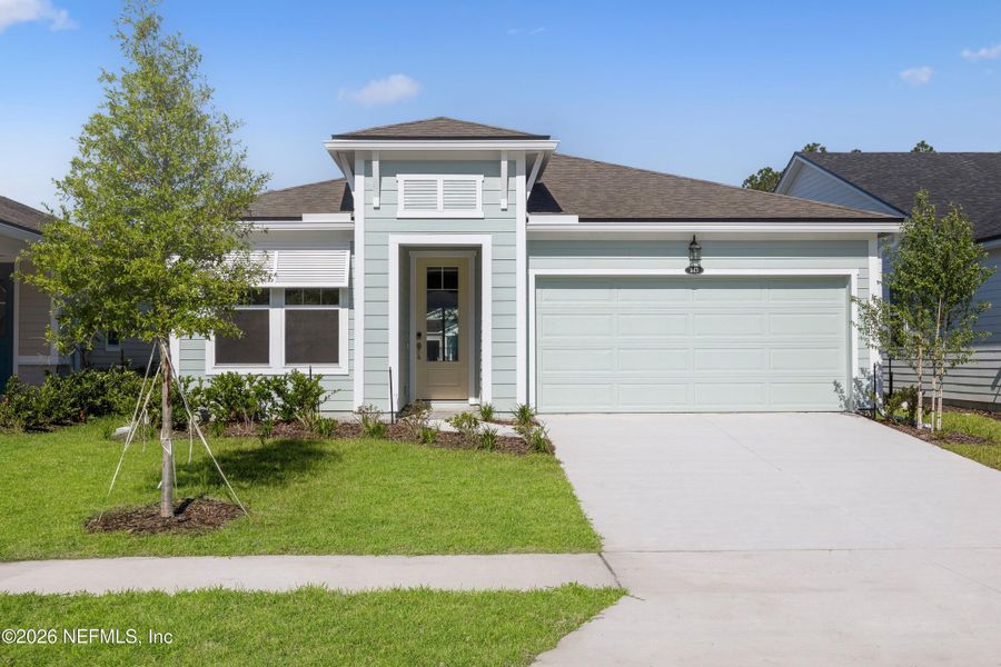 Front exterior of a new home in RiverTown, St. Johns, FL, highlighting curb appeal (Image 1). Front exterior of a new home in RiverTown, St. Johns, FL, highlighting curb appeal (Image 1).