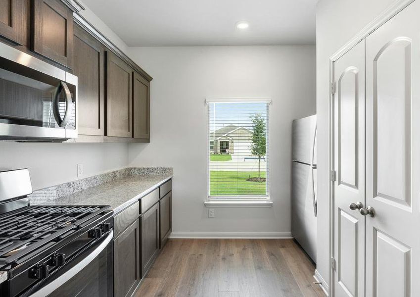 The kitchen has energy-efficient appliances.