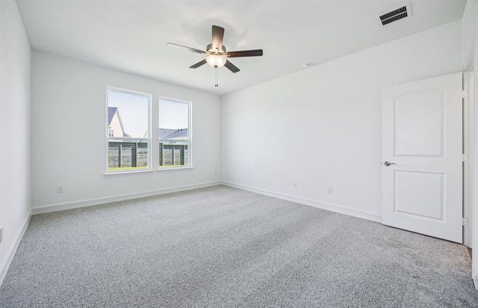 Elegant owner's suite with large windows *real home pictured Elegant owner's suite with large windows *real home pictured