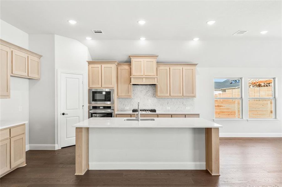 Furnished interior view inside a new home in Painted Tree Woodland District 50, McKinney (Image 12).