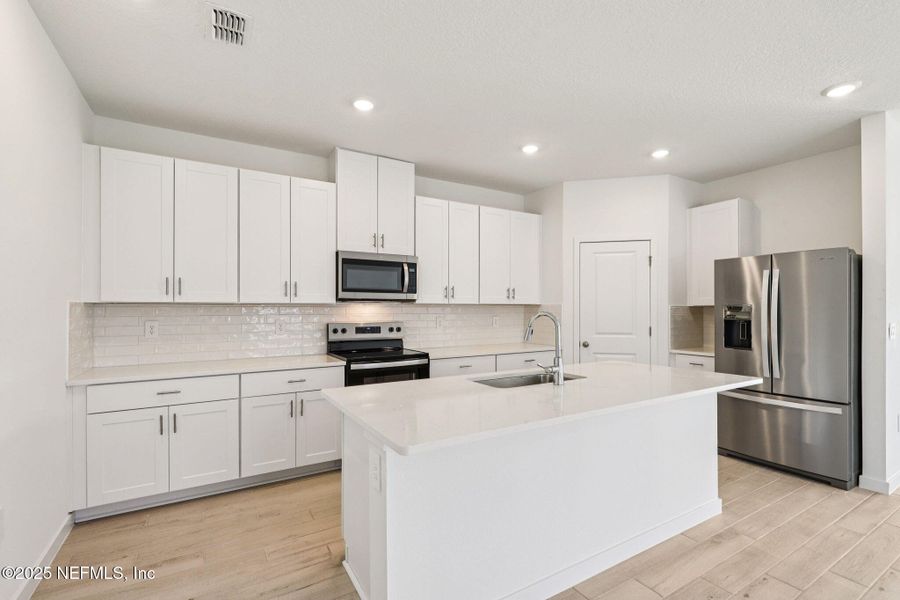 Furnished interior view inside a new home in Cypress Meadows - Signature Series, Jacksonville (Image 5).