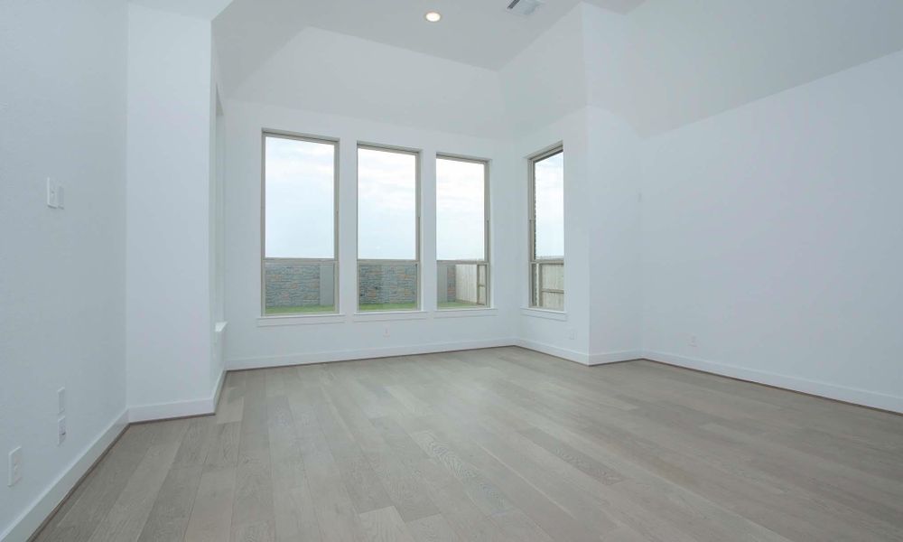Unfurnished room with light wood-style floors and recessed lighting