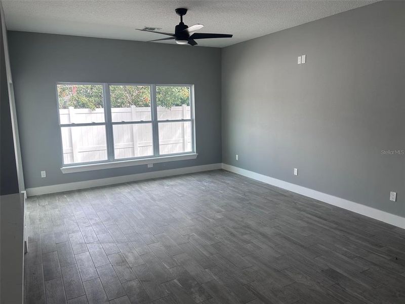 Spacious, unfurnished interior of a new home in , New Smyrna Beach (Image 12).