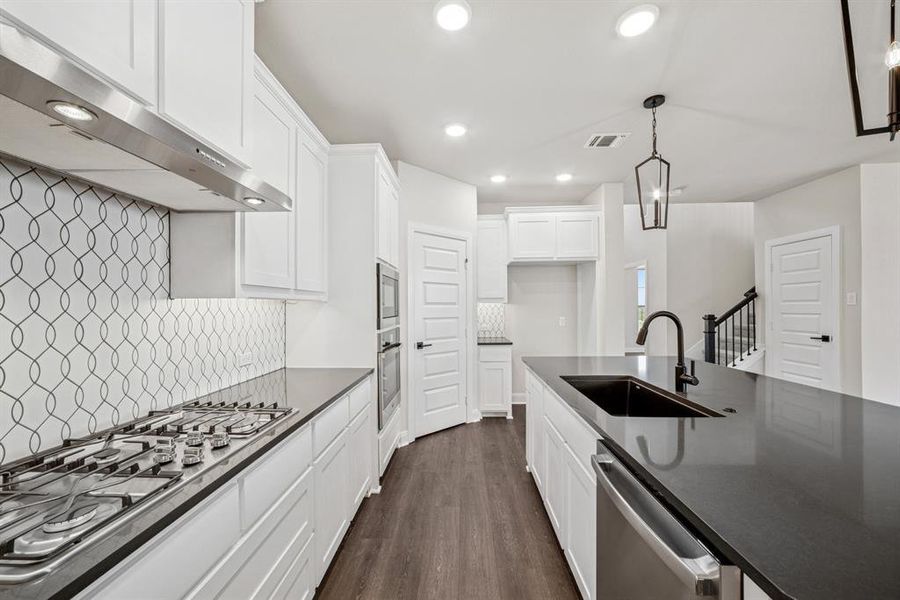 Furnished interior view inside a new home in Karis - Village Series, Crowley (Image 7). Furnished interior view inside a new home in Karis - Village Series, Crowley (Image 7).