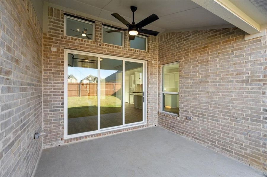Exterior details and patio area of a home in High Country, Burleson (Image 3).