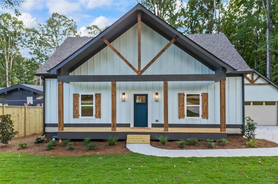 Front exterior of a new home in , Monroe, GA, highlighting curb appeal (Image 35).