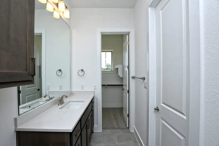 Representative furnished interior of a home built from the Siena III by Giddens Homes in Clearwater Ranch, Liberty Hill (Image 183).