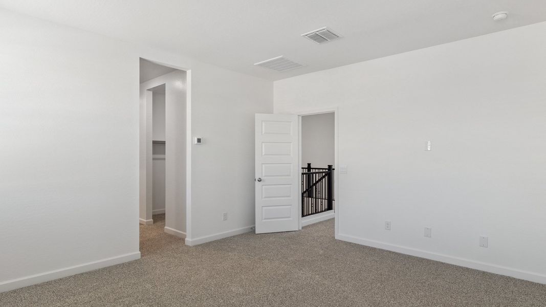 Representative unfurnished interior of a home built from the Crow by D.R. Horton in Zanjero Pass, Glendale (Image 41).