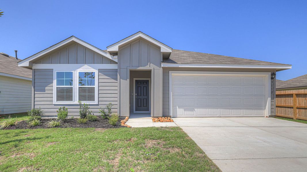 Front exterior of a new home in Navarro Fields, Seguin, TX, highlighting curb appeal (Image 2). Front exterior of a new home in Navarro Fields, Seguin, TX, highlighting curb appeal (Image 2).