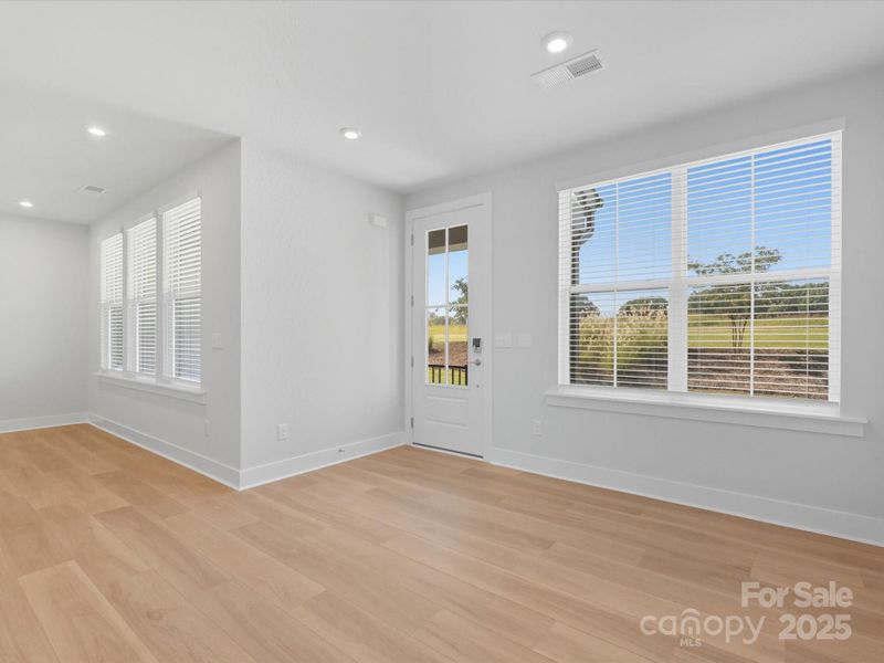 From front entry you'll find an elegant dining space.