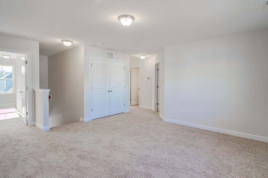 Representative unfurnished interior of a home built from the Drayton by Caviness & Cates Communities in Bartlett Manor, Youngsville (Image 84).
