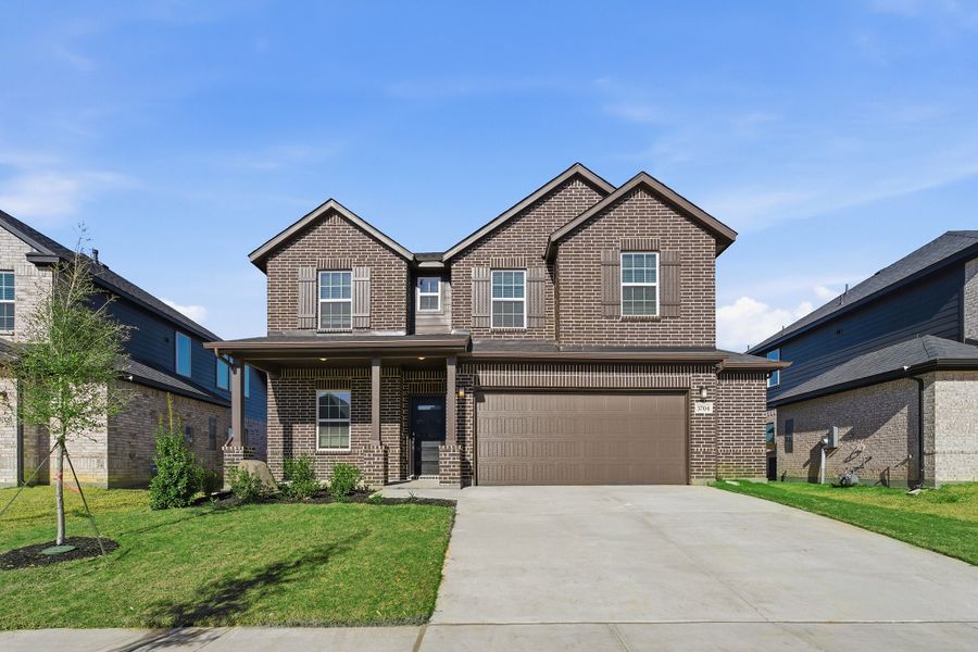 Front exterior of a new home in Sagebrook, Argyle, TX, highlighting curb appeal (Image 1). Front exterior of a new home in Sagebrook, Argyle, TX, highlighting curb appeal (Image 1).