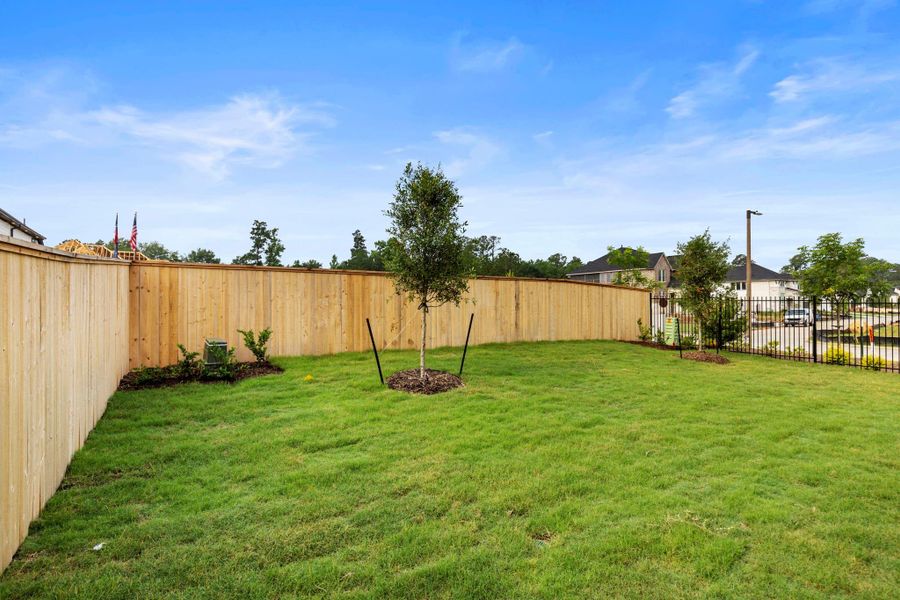 Exterior details and patio area of a home in , The Woodlands (Image 18).