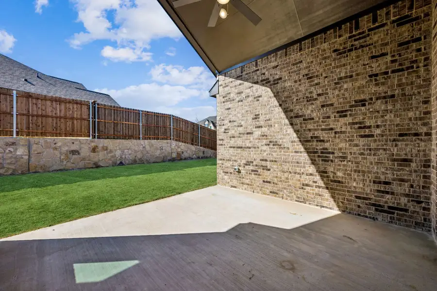 Exterior details and patio area of a home in Westside Preserve, Midlothian (Image 3).