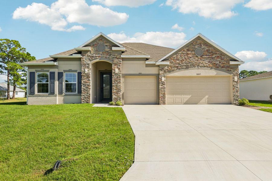 Representative exterior photo of a completed home built from the The Venice by Maronda Homes in Palm Coast, Palm Coast, FL (Image 2).