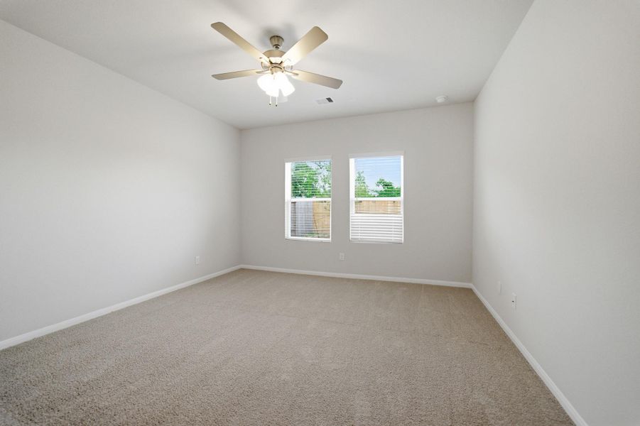 Spacious, unfurnished interior of a new home in The Pines at Seven Coves, Willis (Image 19).