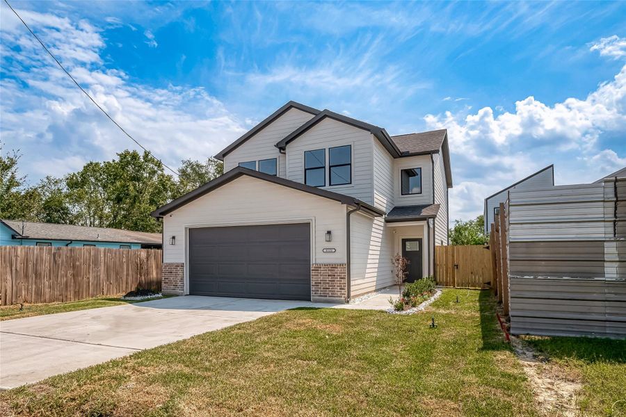 Front exterior of a new home in , Houston, TX, highlighting curb appeal (Image 1). Front exterior of a new home in , Houston, TX, highlighting curb appeal (Image 1).