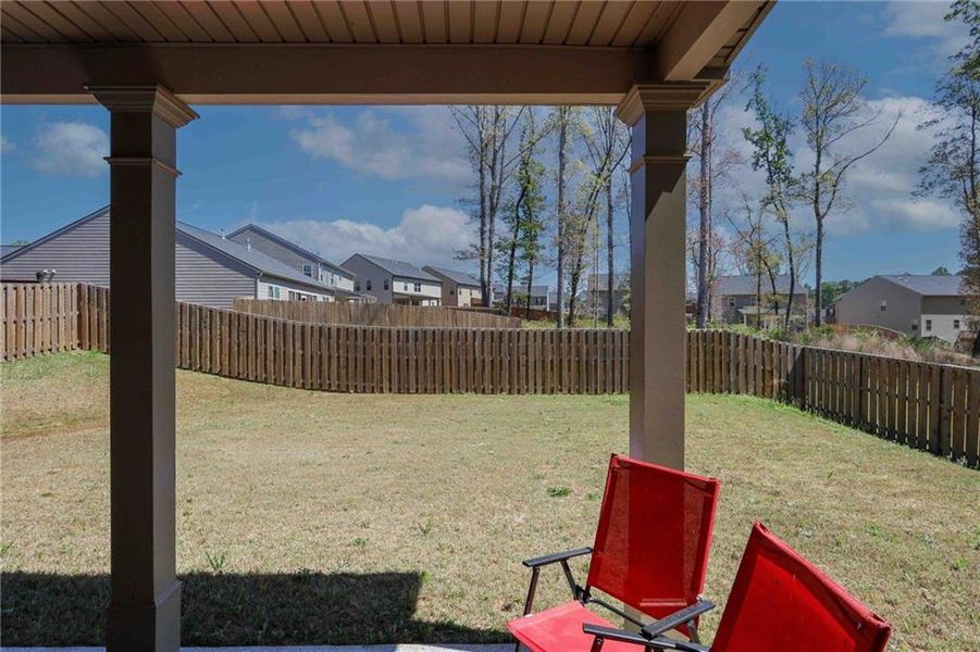 Exterior details and patio area of a home in The Enclave at Flat Rock Hills, Stonecrest (Image 3).