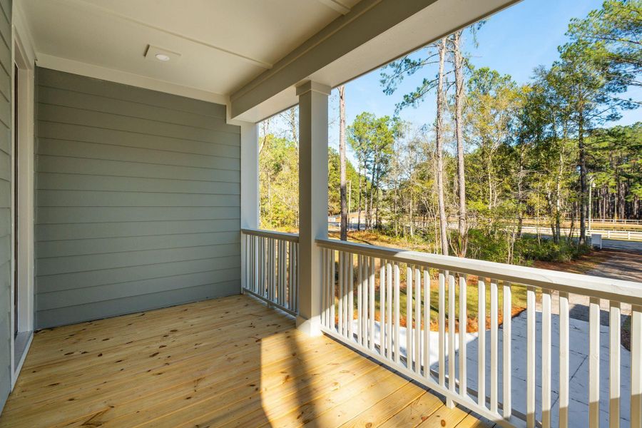 Exterior details and patio area of a home in , Awendaw (Image 36).