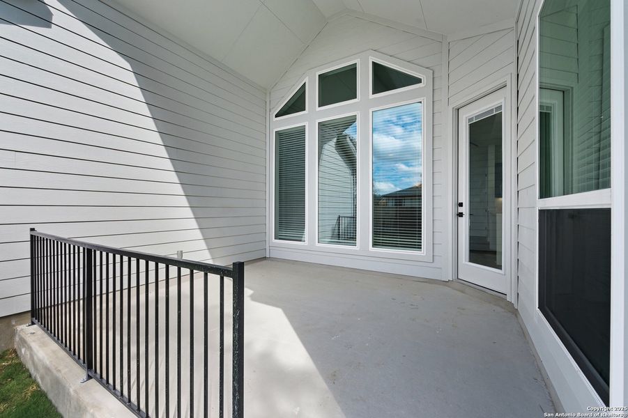 Exterior details and patio area of a home in The Reserve at Potranco Oaks, Castroville (Image 3).