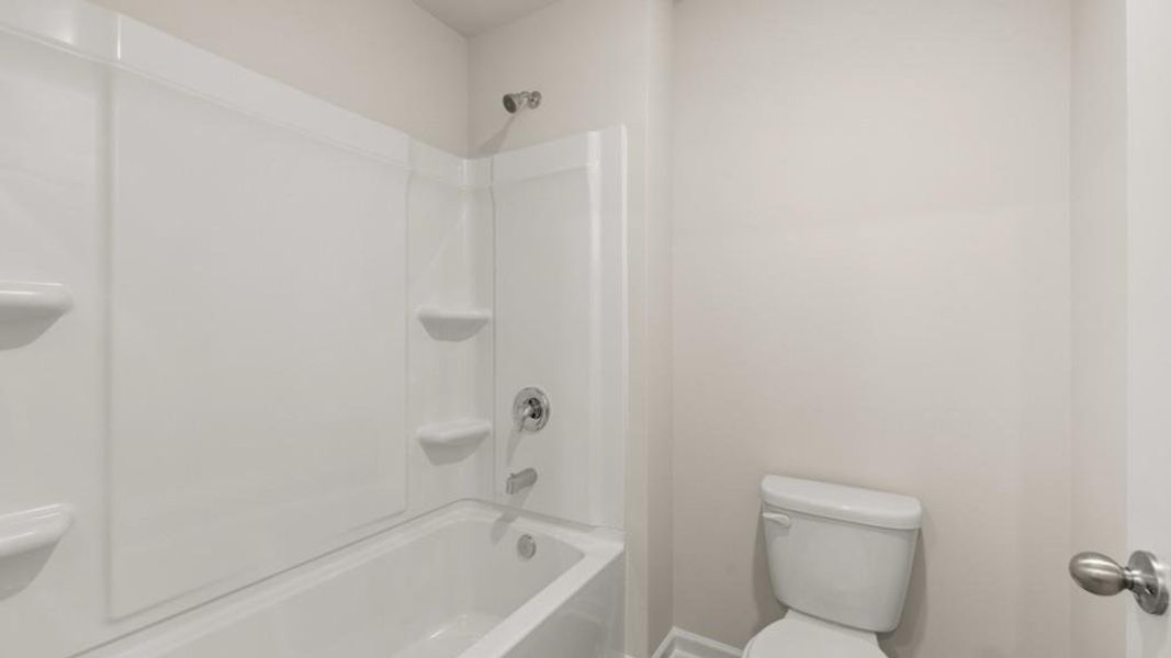 Furnished interior view inside a new home in Northwoods at Mirror Lake, Villa Rica (Image 6).