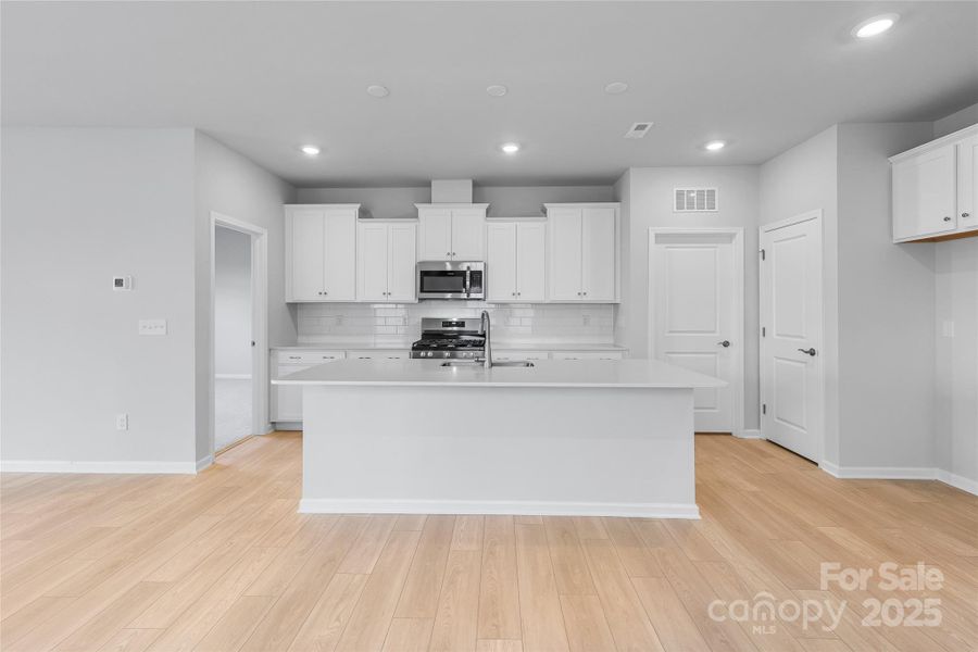 Furnished interior view inside a new home in Redhawk: Walk, Belmont (Image 6).