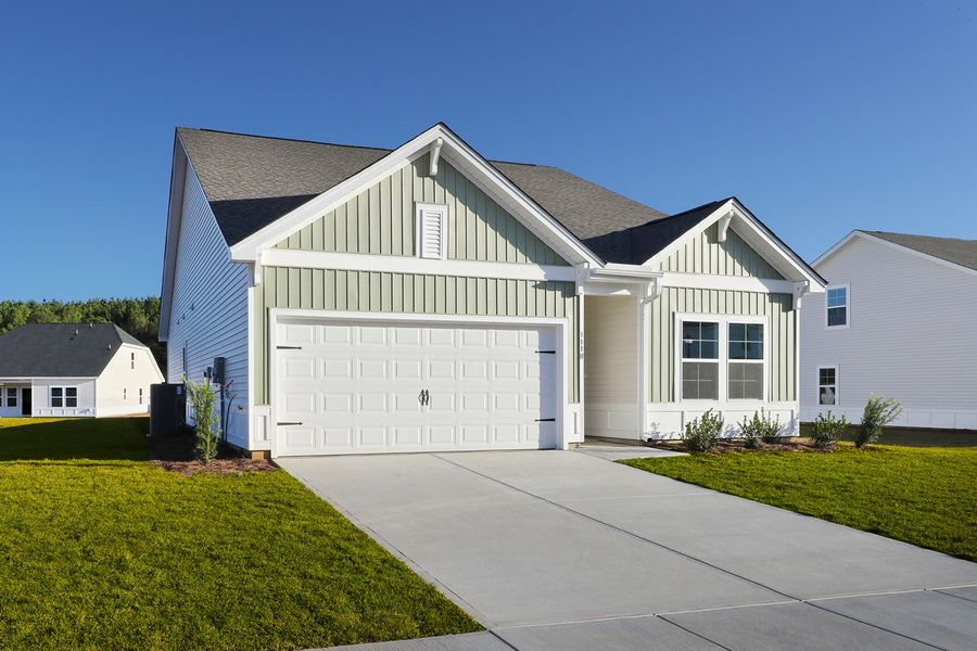 Front exterior of a new home in Hainer Place, Conway, SC, highlighting curb appeal (Image 2).