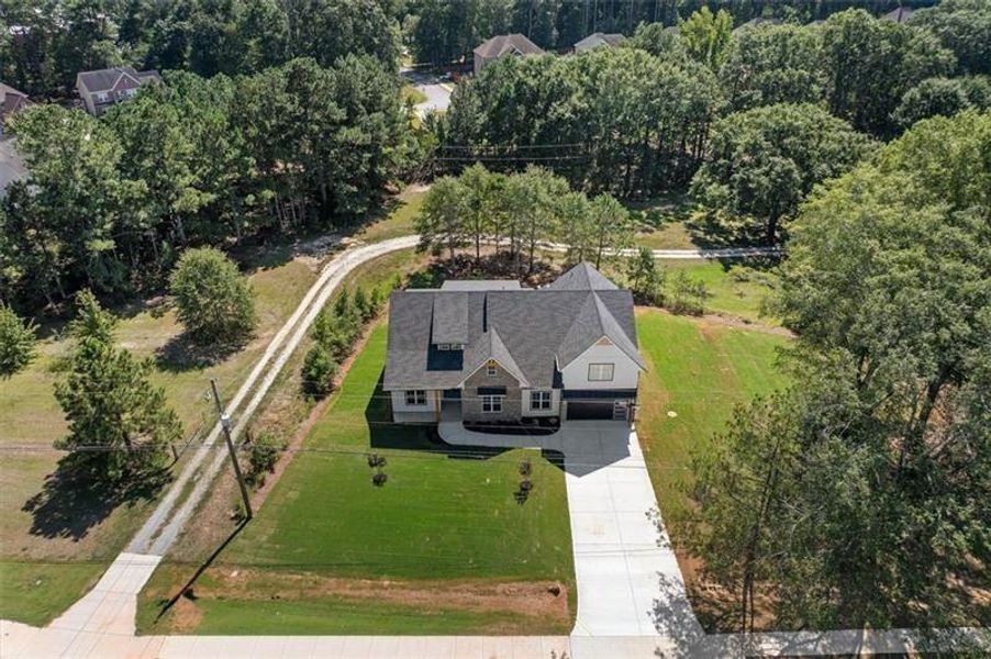 Front exterior of a new home in , Powder Springs, GA, highlighting curb appeal (Image 31).