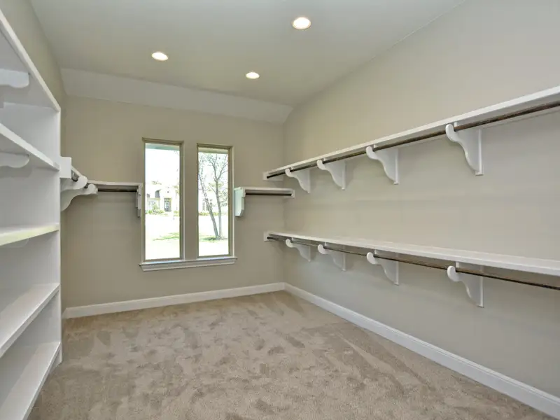 Representative unfurnished interior of a home built from the Santa Barbara II by Giddens Homes in Scofield Farms Estates, Georgetown (Image 108).