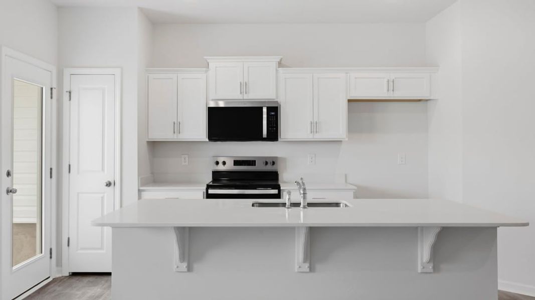 Furnished interior view inside a new home in Tanglewood Townes, Greenville (Image 7).