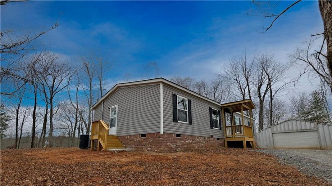 Exterior details and patio area of a home in , Dahlonega (Image 25). Exterior details and patio area of a home in , Dahlonega (Image 25).