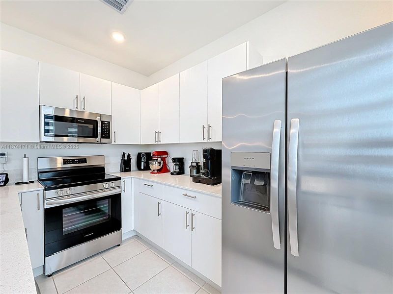 Furnished interior view inside a new home in , Homestead (Image 8). Furnished interior view inside a new home in , Homestead (Image 8).
