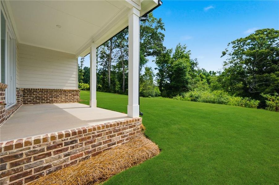 Exterior details and patio area of a home in Acacia, Cumming (Image 28). Exterior details and patio area of a home in Acacia, Cumming (Image 28).