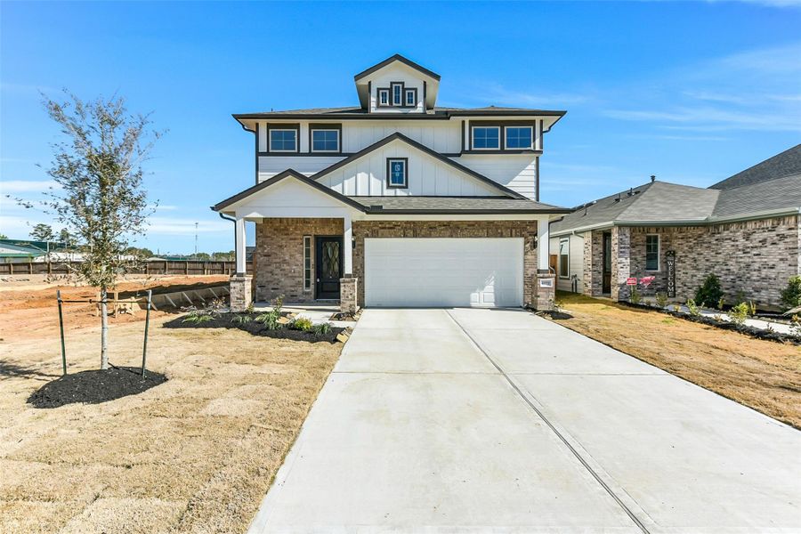 Front exterior of a new home in Colony at Pinehurst, Pinehurst, TX, highlighting curb appeal (Image 2).