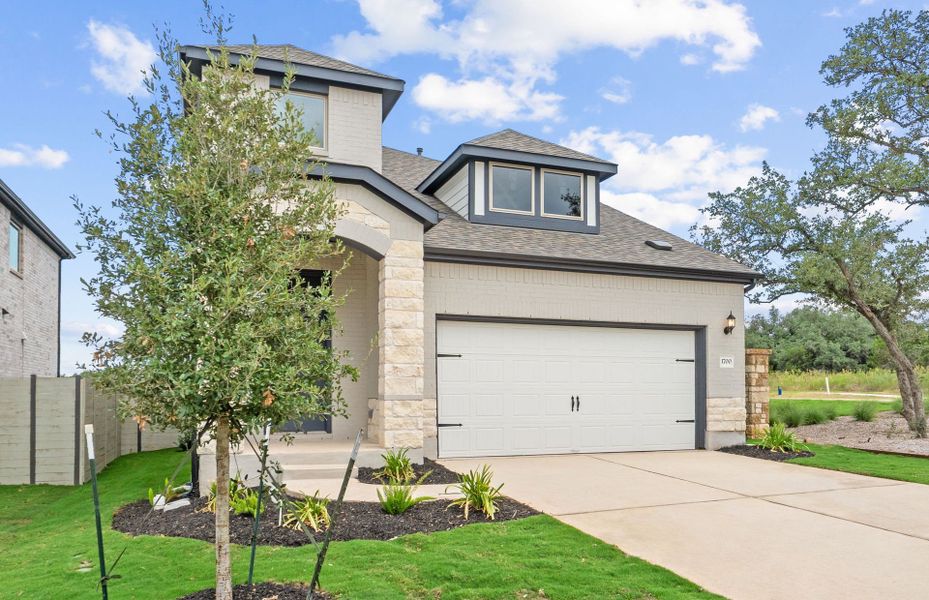 Front exterior of a new home in Wolf Ranch, Georgetown, TX, highlighting curb appeal (Image 19).