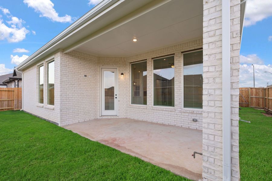 Representative exterior photo of a completed home built from the Pendleton by Chesmar Homes in Jordan Ranch, Fulshear, TX (Image 15).