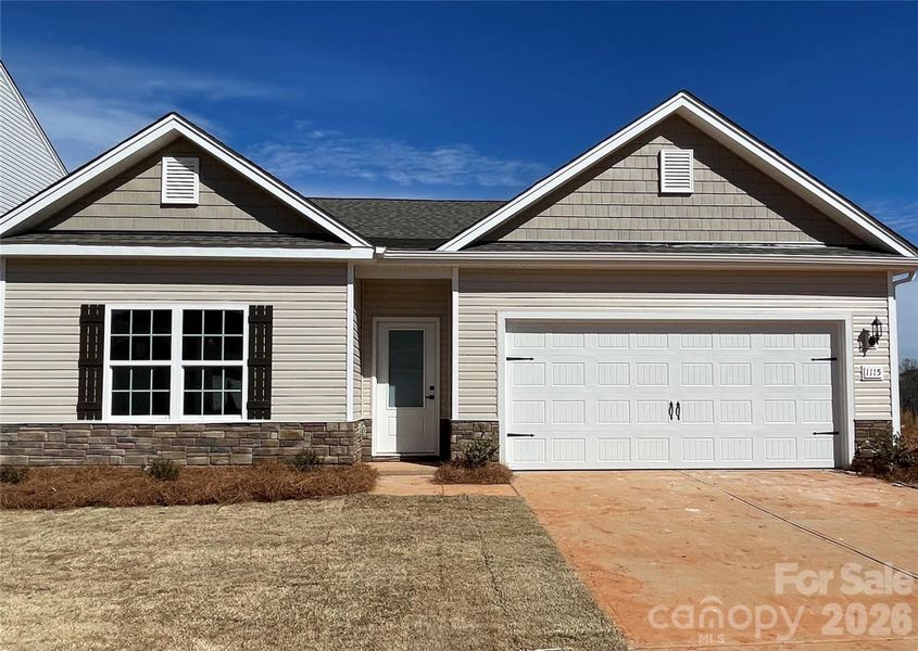 Front exterior of a new home in Knights Bridge, Richburg, SC, highlighting curb appeal (Image 1). Front exterior of a new home in Knights Bridge, Richburg, SC, highlighting curb appeal (Image 1).