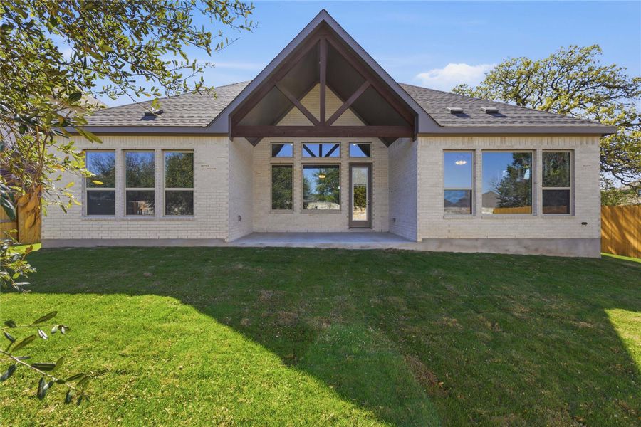 Exterior details and patio area of a home in Oaks at San Gabriel, Georgetown (Image 20).