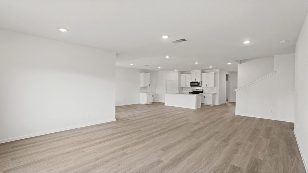 Representative unfurnished interior of a home built from the Midland by D.R. Horton in New Waverly Station, New Waverly (Image 14).