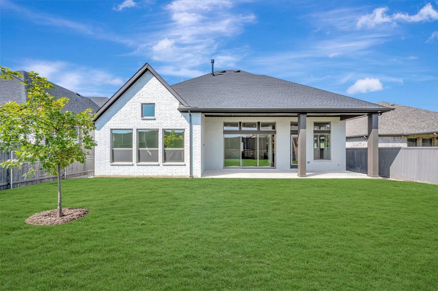 Exterior details and patio area of a home in Goodland – Manor Series, Grand Prairie (Image 3). Exterior details and patio area of a home in Goodland – Manor Series, Grand Prairie (Image 3).