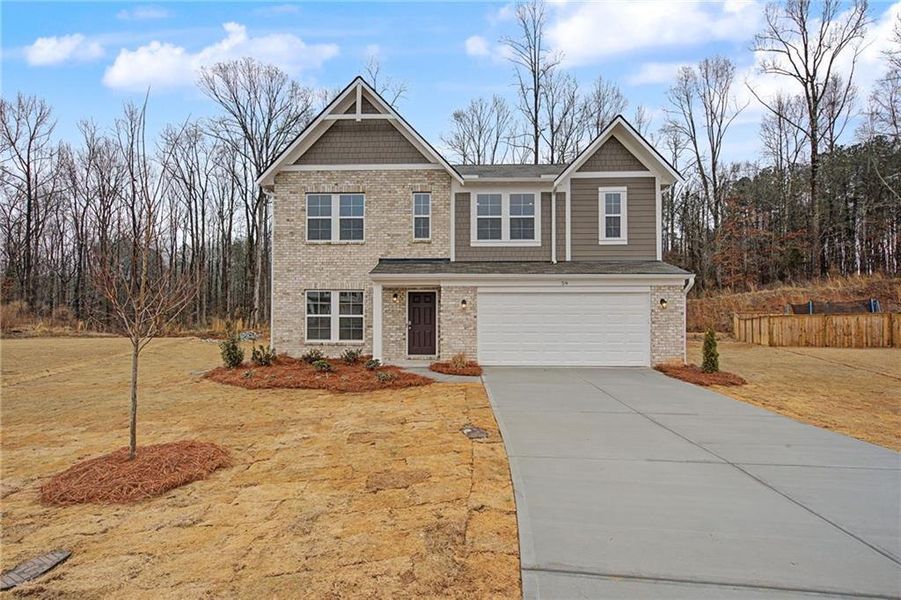 Front exterior of a new home in Crossvine Estates, Braselton, GA, highlighting curb appeal (Image 21).