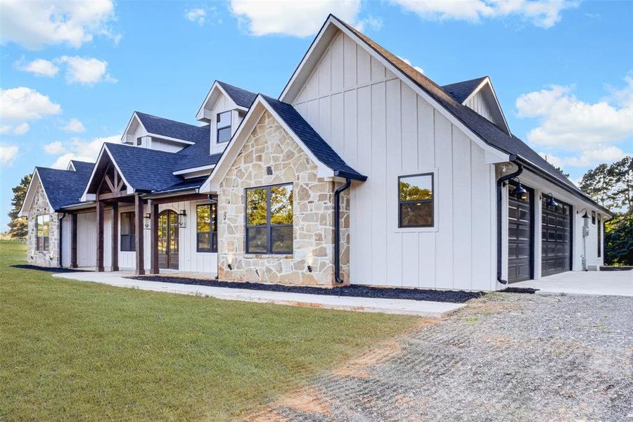 Front exterior of a new home in , Longview, TX, highlighting curb appeal (Image 22). Front exterior of a new home in , Longview, TX, highlighting curb appeal (Image 22).