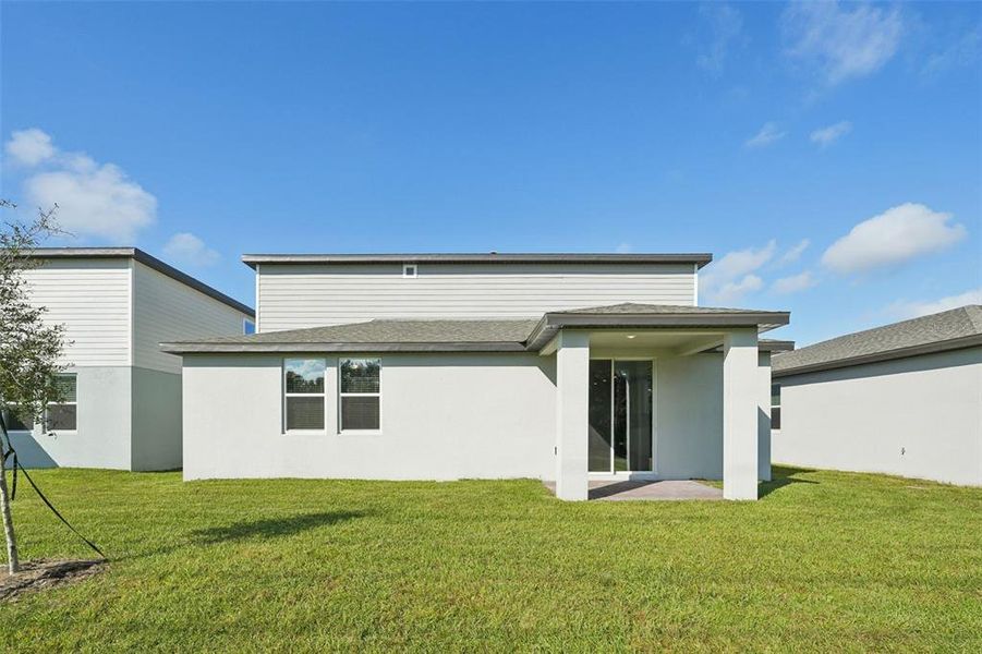 Exterior details and patio area of a home in The Meadow at Crossprairie, St. Cloud (Image 17).