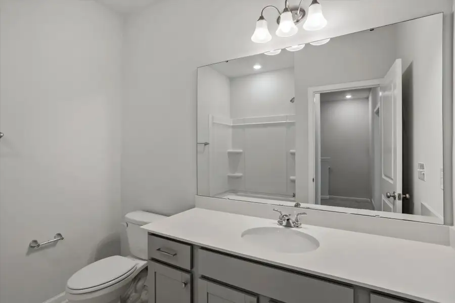 Furnished interior view inside a new home in West Main Townhomes, Sanford (Image 12).