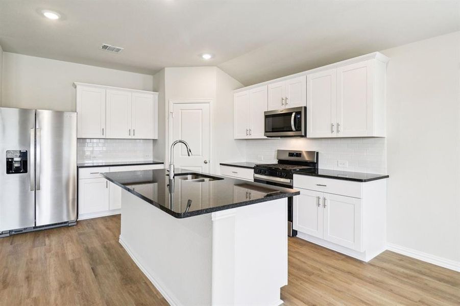 Furnished interior view inside a new home in Trails of Lavon - Signature Series, Lavon (Image 16). Furnished interior view inside a new home in Trails of Lavon - Signature Series, Lavon (Image 16).