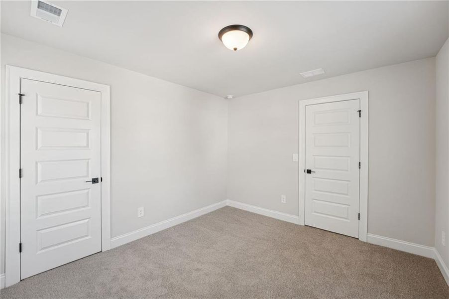 Spacious, unfurnished interior of a new home in Hemingway - Reserve Series, Cumming (Image 42). Spacious, unfurnished interior of a new home in Hemingway - Reserve Series, Cumming (Image 42).