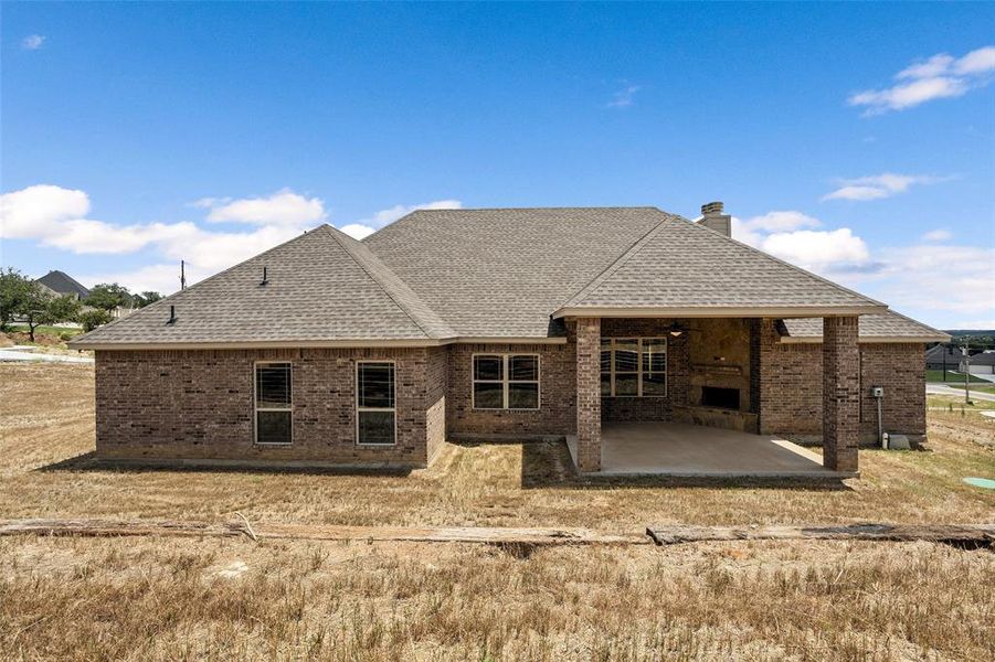 Back of property featuring a patio