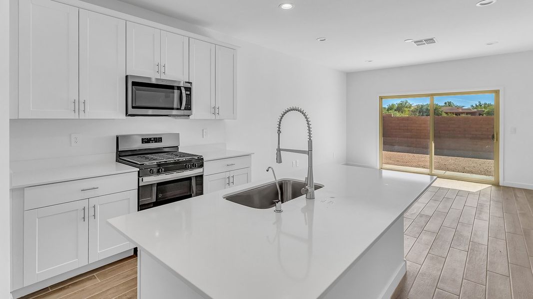 Furnished interior view inside a new home in The Oasis at Rocking K, Vail (Image 6).