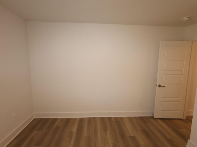 Spacious, unfurnished interior of a new home in Lone Star Landing, Montgomery (Image 24).